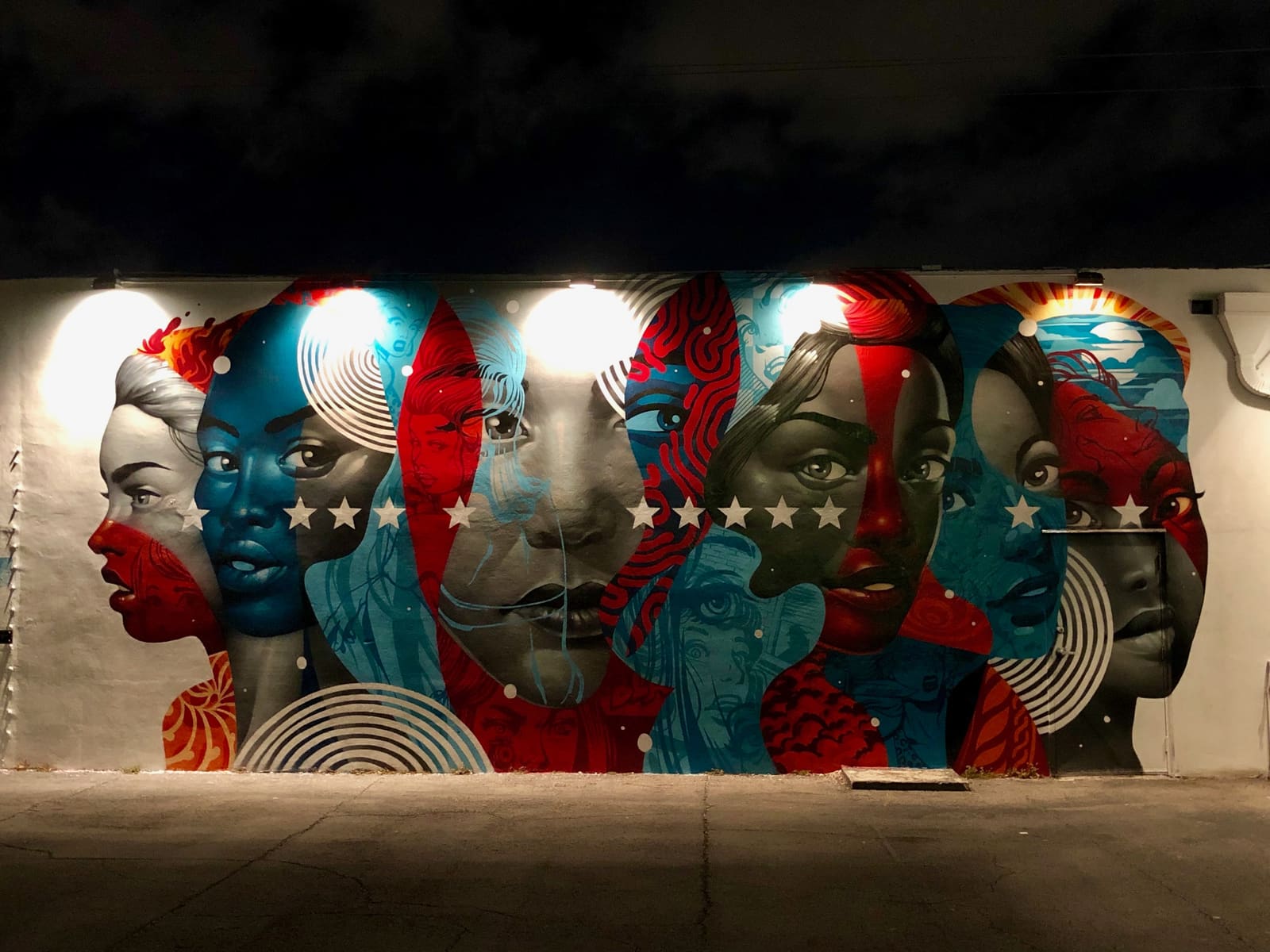 Layered faces mural by John Park